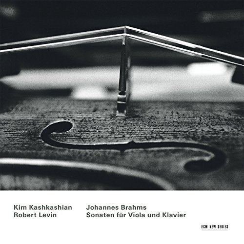 Black and white image of a violin's f-hole and bridge on a CD cover.