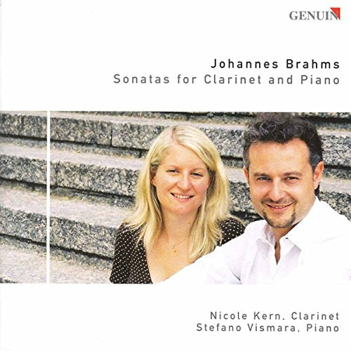 A CD cover featuring a man and woman standing on stone steps together.