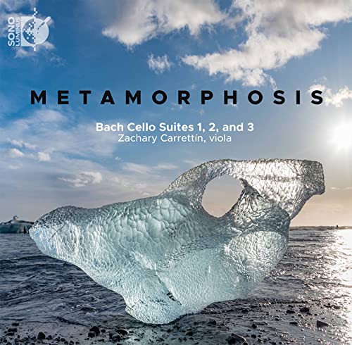 CD cover for “Metamorphosis” featuring a large ice formation on a beach.
