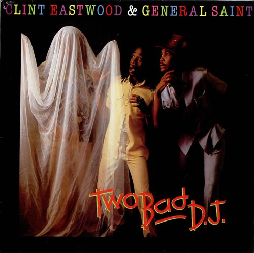 "Album cover with three men, one veiled, against a dark background."