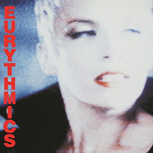 "Album cover featuring a close-up of a woman's face with 'Eurythmics' written vertically."