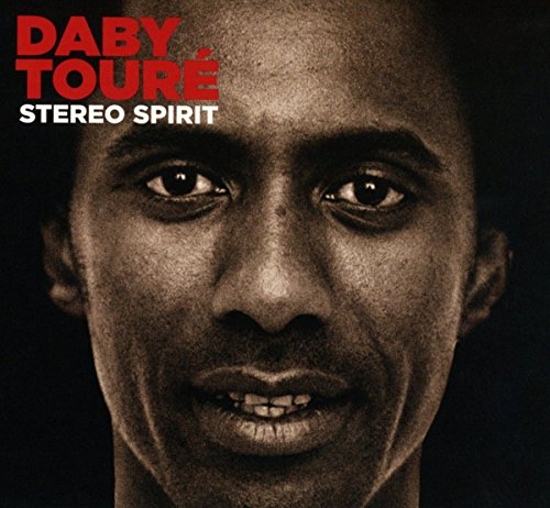"Daby Toure's 'Stereo Spirit' CD cover featuring a close-up of his face."