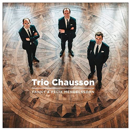 CD cover: Three formally dressed men standing on a patterned floor.