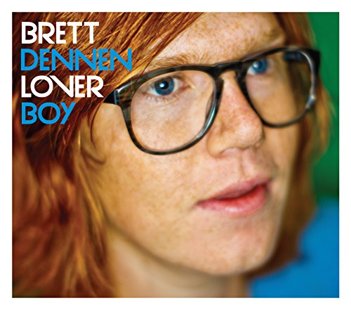 Brett Dennen's album cover featuring a close-up of his face with glasses and red hair.