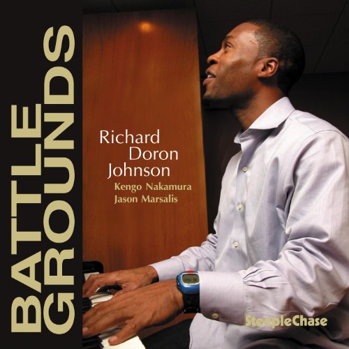 CD cover: jazz pianist Richard Doron Johnson performing, album title "Battle Grounds".
