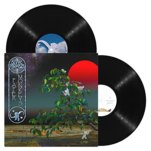 Ozric Tentacles “Paper Monkeys” vinyl record with monkey and tree artwork.