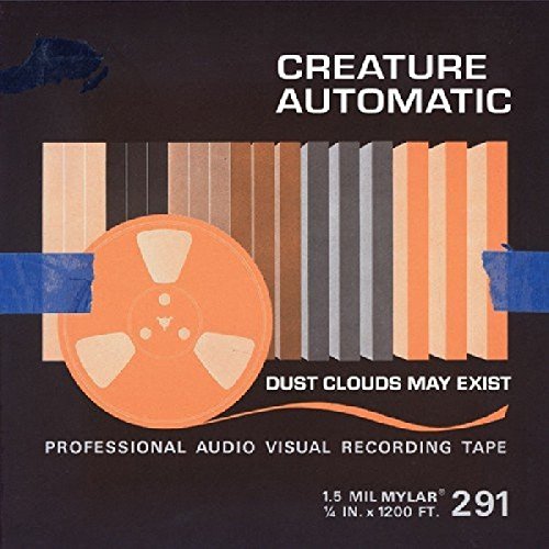 The image is a vinyl record cover for "Creature Automatic - Dust Clouds May Exist". For accessibility purposes, a suitable alt text could be: "Black vinyl record cover with orange reel and blue tape."