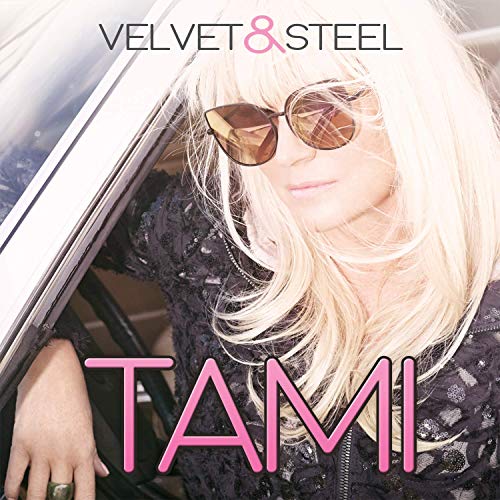 Album cover featuring a blonde woman wearing sunglasses, leaning out of a car window.