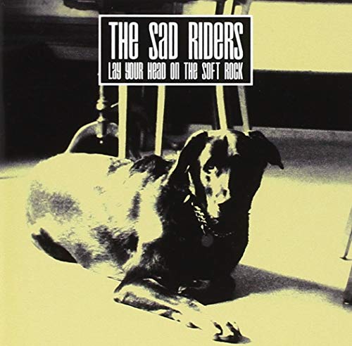 CD cover featuring a black and white photo of a dachshund lying down.