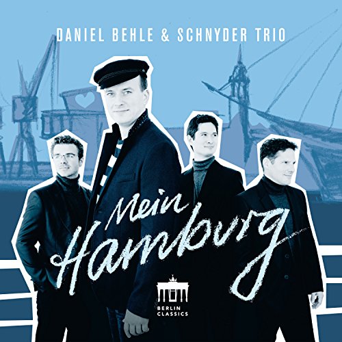 "CD cover featuring four men in dark attire, with a shipyard background."