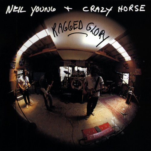 "Album cover featuring a dark room with three musicians playing instruments under spotlights."