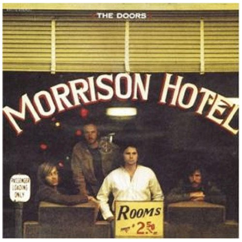 The Doors' album cover featuring four men and a hotel sign.