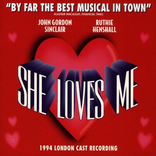Red CD cover with a heart and the title "She Loves Me" in white text.