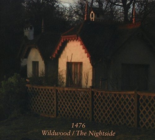 Ornate, small building with towers, nighttime scene, CD cover art.