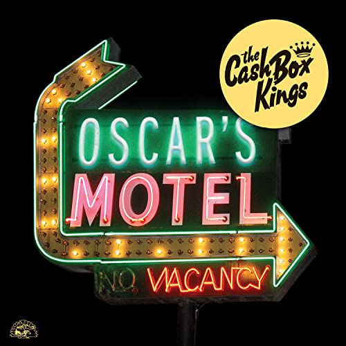 Neon motel sign reading "Oscar's Motel" with a yellow circular logo.