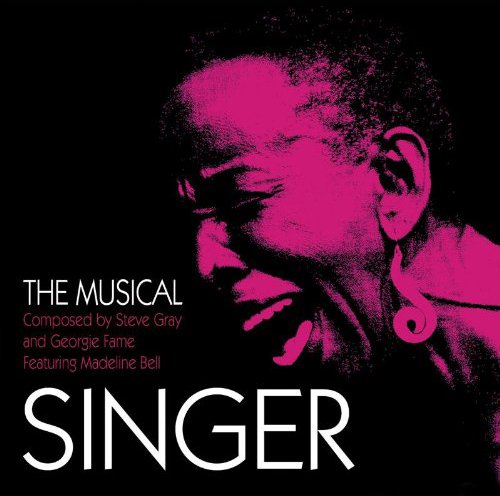 Album cover with a pink-toned man singing into a microphone on a black background.