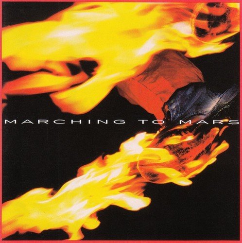 Album cover with a black background, red border, and a fiery, abstract design.
