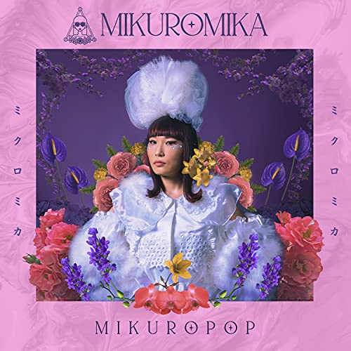 CD cover: woman with flowers and ornate white headwear.