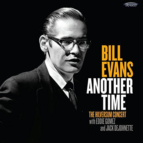 Black-and-white image of Bill Evans on a black album cover with yellow and white text.