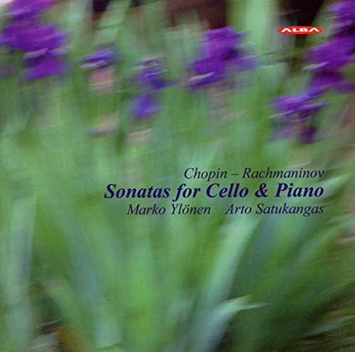 Blurry image of purple flowers with blue and black text on a green background.
