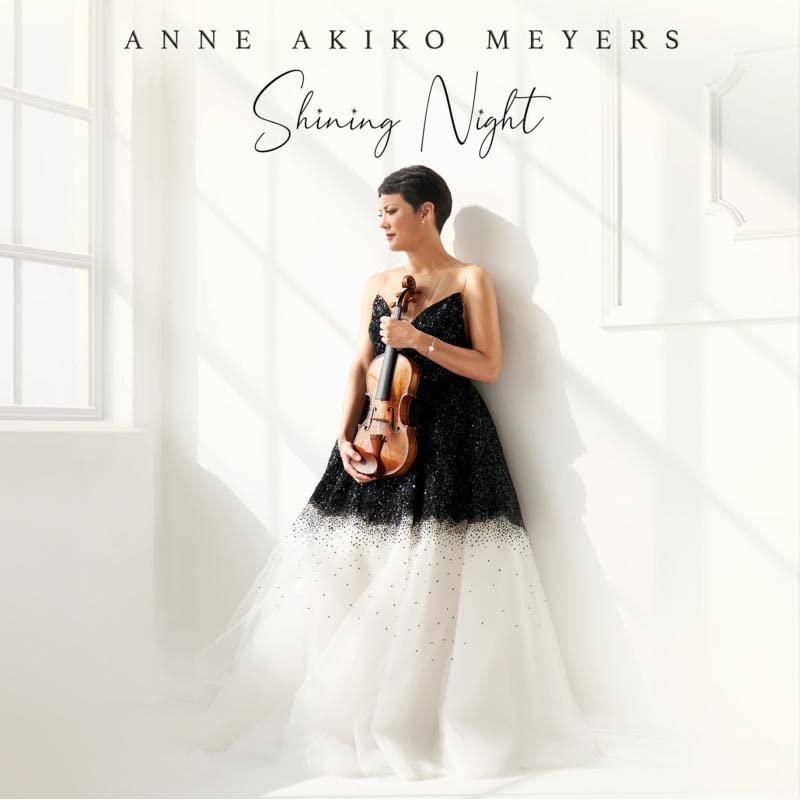 Violinist Anne Akiko Meyers in a starry gown, album cover art.