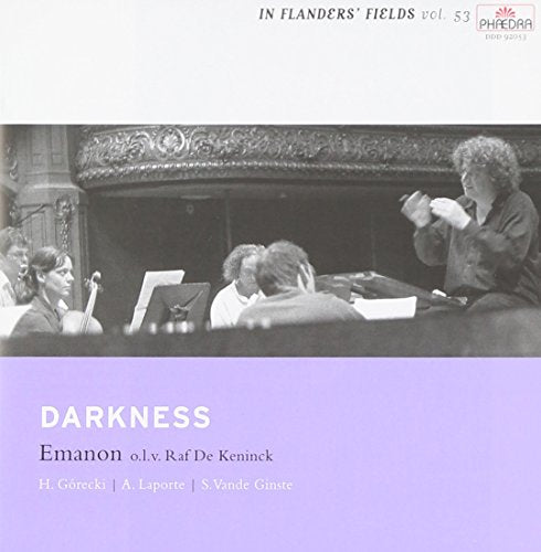 "CD cover with black-and-white photo of musicians and purple background with white text."