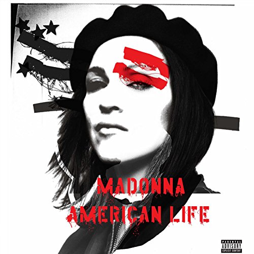 Madonna in black veil, with red and black American flag imagery.