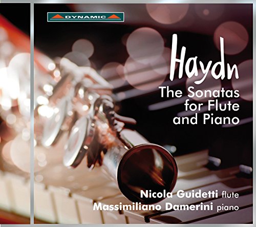 "CD cover featuring a flute on piano keys with 'Haydn' and artist names."