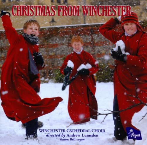 "CD cover featuring three choirboys in red robes playing in the snow."