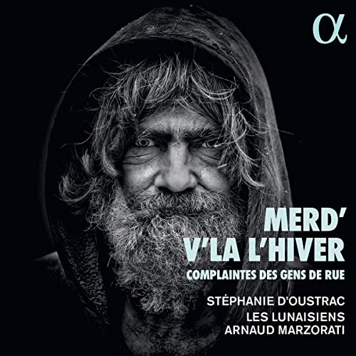 CD cover: close-up of a bearded man in a hood, dark and moody.