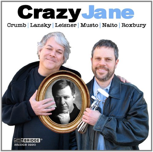 "CD cover with two men holding a framed black and white portrait."