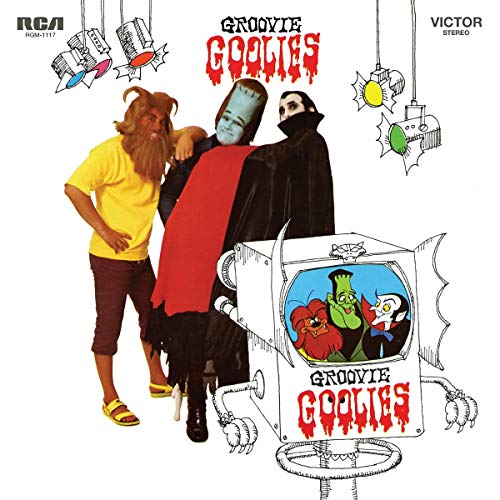 "Album cover featuring cartoon characters, a TV, and hanging objects on a white background."