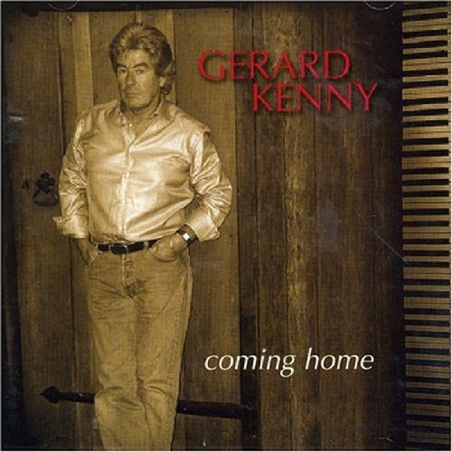 Album cover with man standing in front of a wooden door, piano keys on the side.