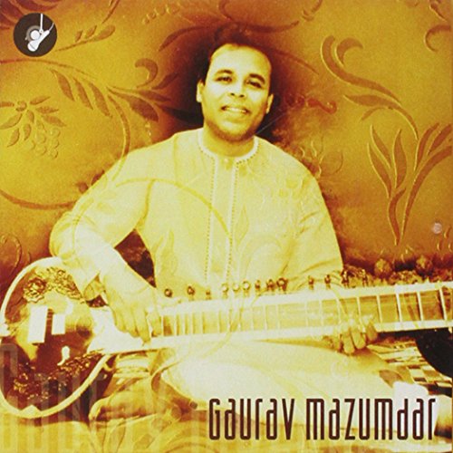 "Man in traditional clothing holding a sitar, sepia-toned album cover with artist's name."