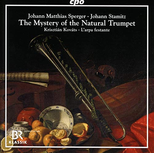 CD cover featuring antique brass instruments, fruit, and sheet music.