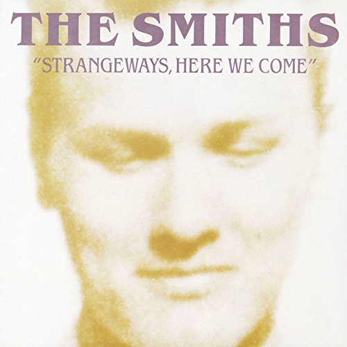 The Smiths vinyl album cover featuring a close-up of a man's face.