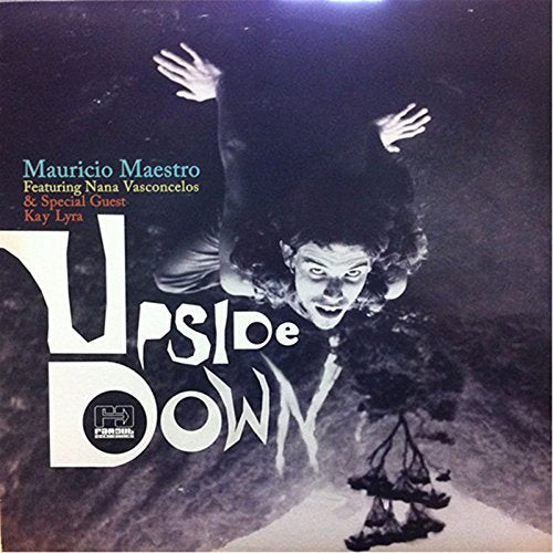 "CD cover art with a person falling upside down, with a ship below."
