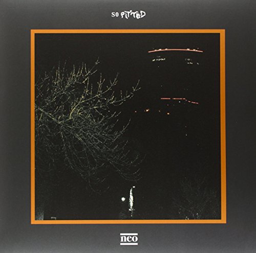 Record album cover: dark, silhouetted branches against a blurred, reddish cityscape.