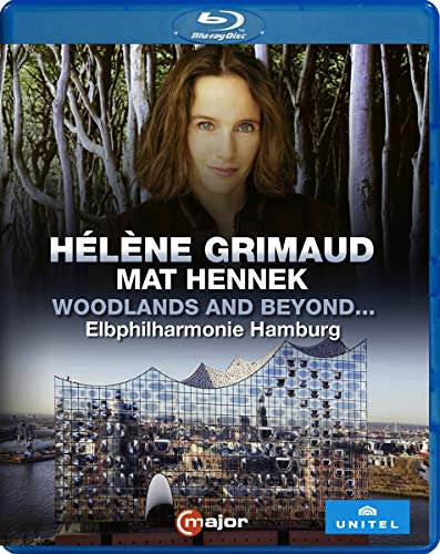 Blue-ray case cover featuring a woman in a forest and a modern building.