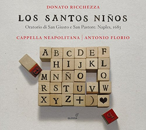 "CD cover with wooden alphabet tiles and text in Spanish and Italian."