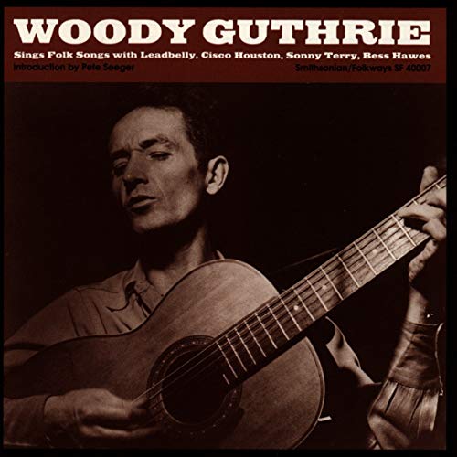 Woody Guthrie portrait with guitar on the CD cover.