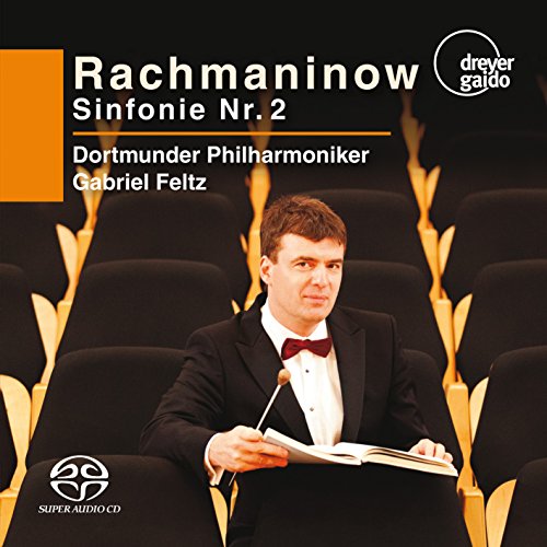 CD cover featuring conductor Gabriel Feltz and concert hall seats.