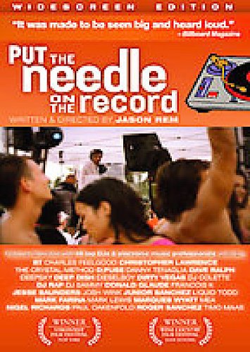 DVD cover for "Put The Needle On The Record" with concert crowd.