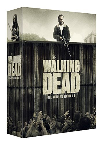 DVD box set for "The Walking Dead" with a man on a wooden fence.