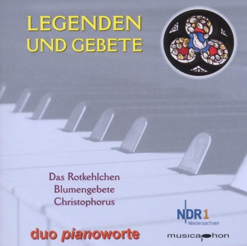 A CD cover featuring piano keys and a stained-glass dove design with text overlays.