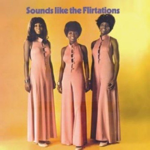 "Album cover with three women in pink dresses against a yellow background."