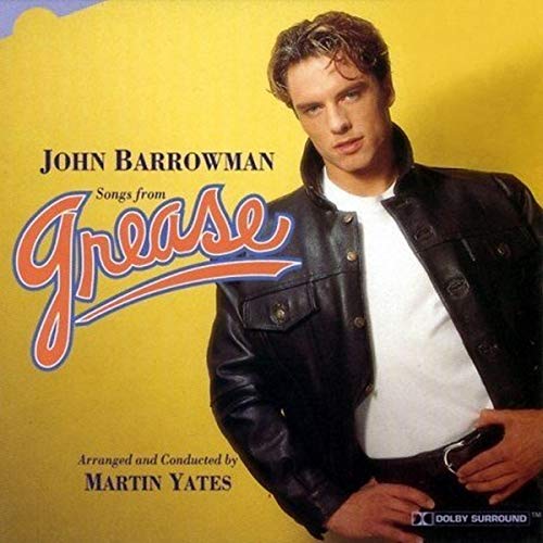 CD cover featuring John Barrowman in a leather jacket for Grease songs.