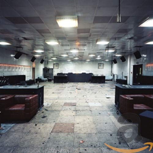 CD cover for Spector’s “Moth Boys” depicts a dimly lit, empty room.
