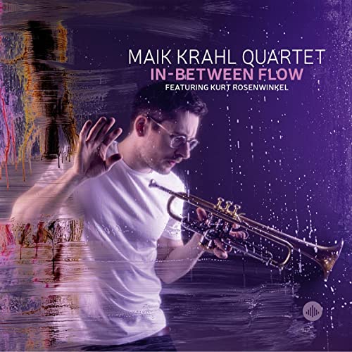 Album cover featuring a man with a trumpet against an abstract background.