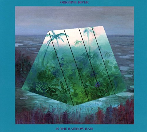 A CD album cover featuring a surreal, tropical landscape with a geometric shape.